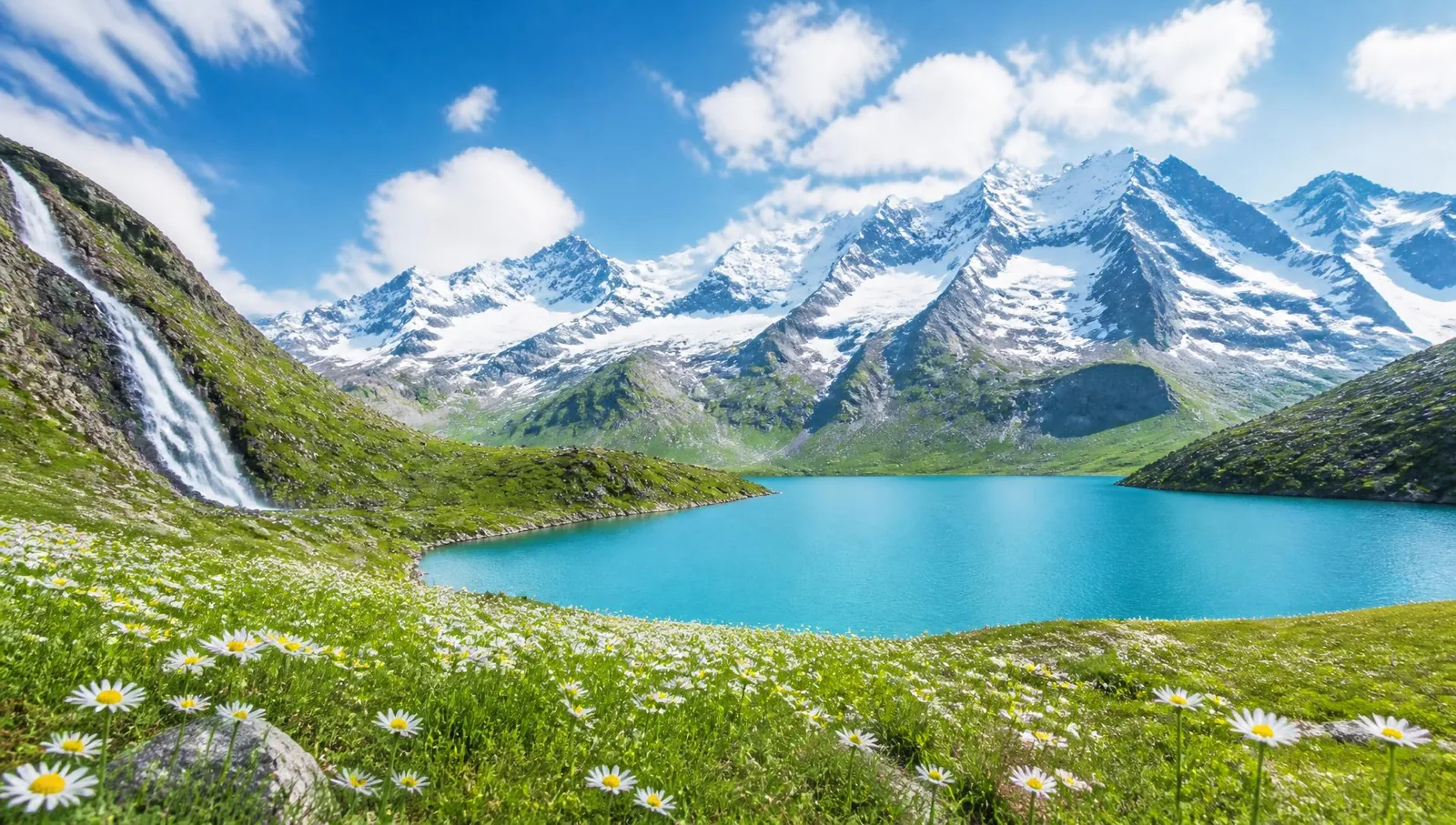 Alpine mountain lake and meadow